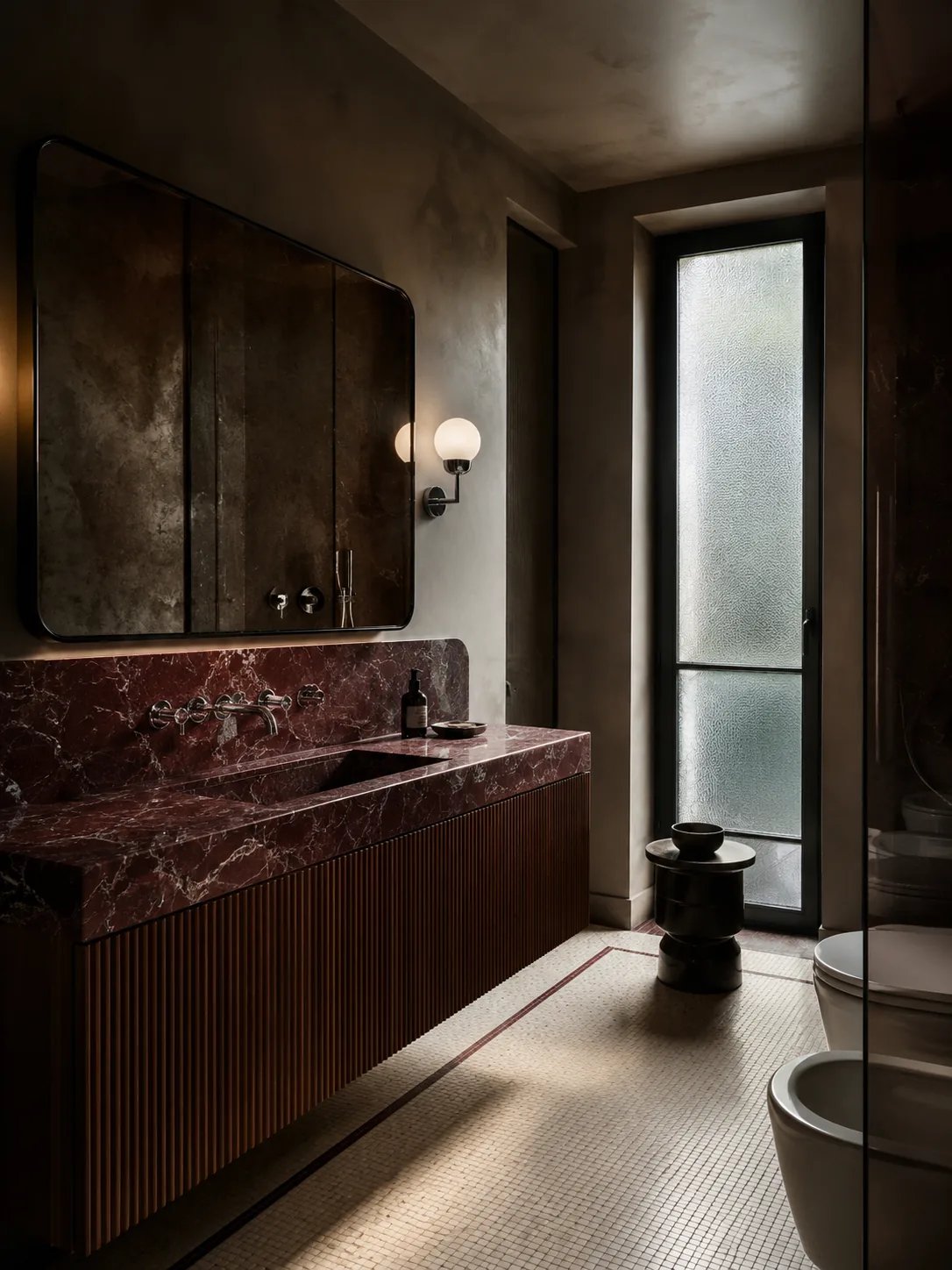 Italian modernist bathroom with burgundy marble, ribbed walnut cabinetry, chrome fixtures, and ivory mosaic floor
