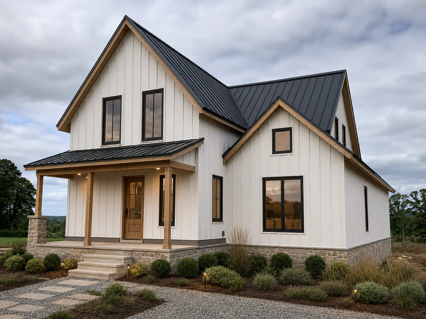 Completed modern farmhouse with soft-white board-and-batten siding, fieldstone, and charcoal roofing